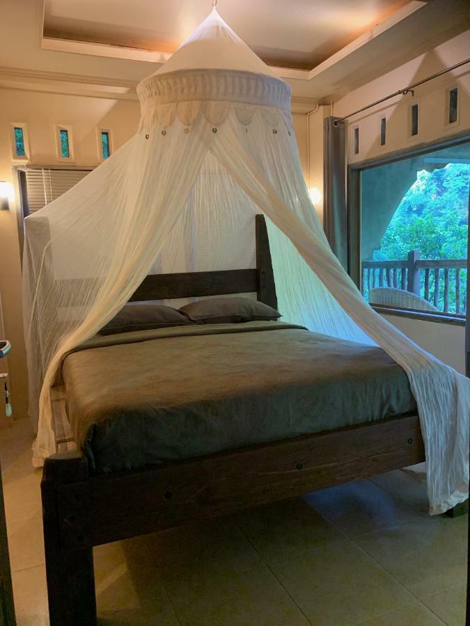 Kupu Kupu Garden Guest House & Cafe Bukit Lawang Ngoại thất bức ảnh